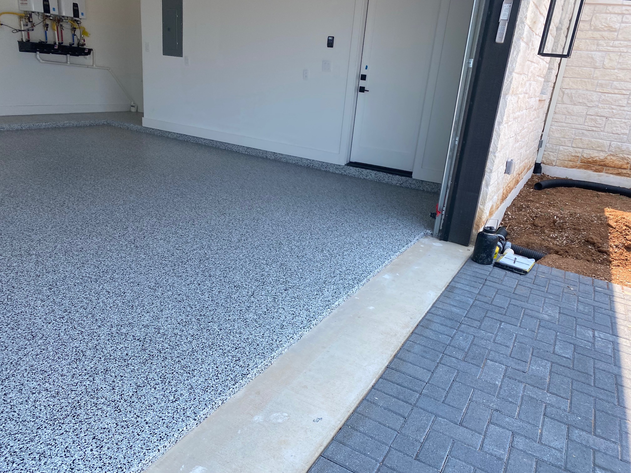 A finished garage floor showcasing epoxy flake coating